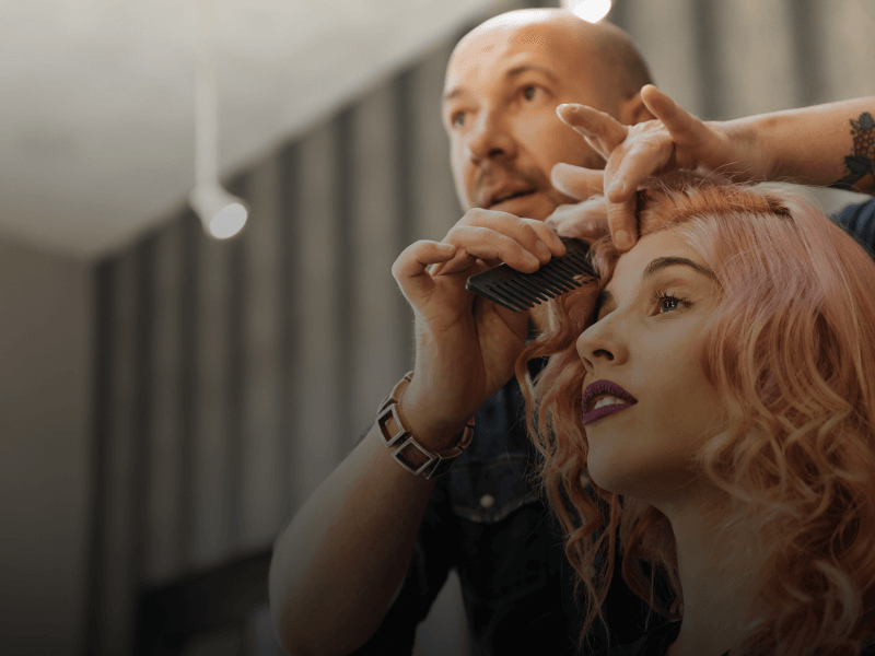 a person cutting hair