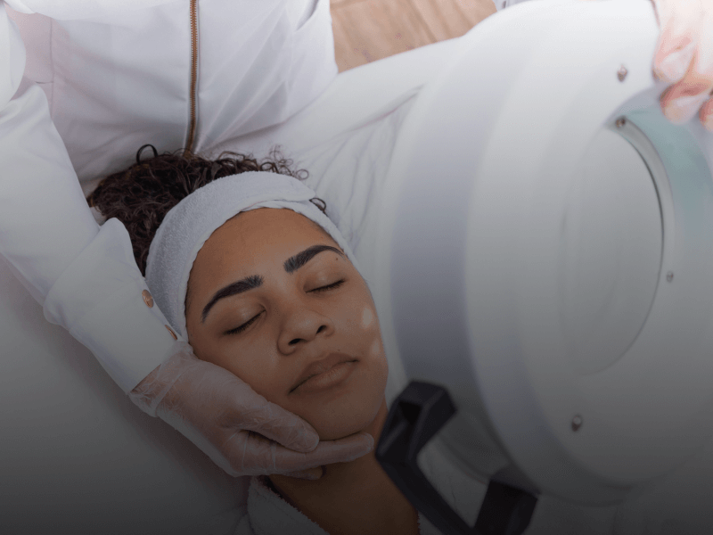 a person laying down for a facial treatment